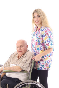nurse helping elderly adult